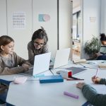 Group of Kids Using Computer in School